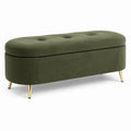 Banc de rangement en velours vert avec pieds métalliques dorés