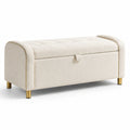 Banc de rangement en tissu polyester beige avec pieds en métal doré